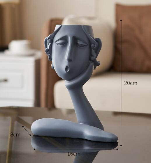 Resin Face Sculptures